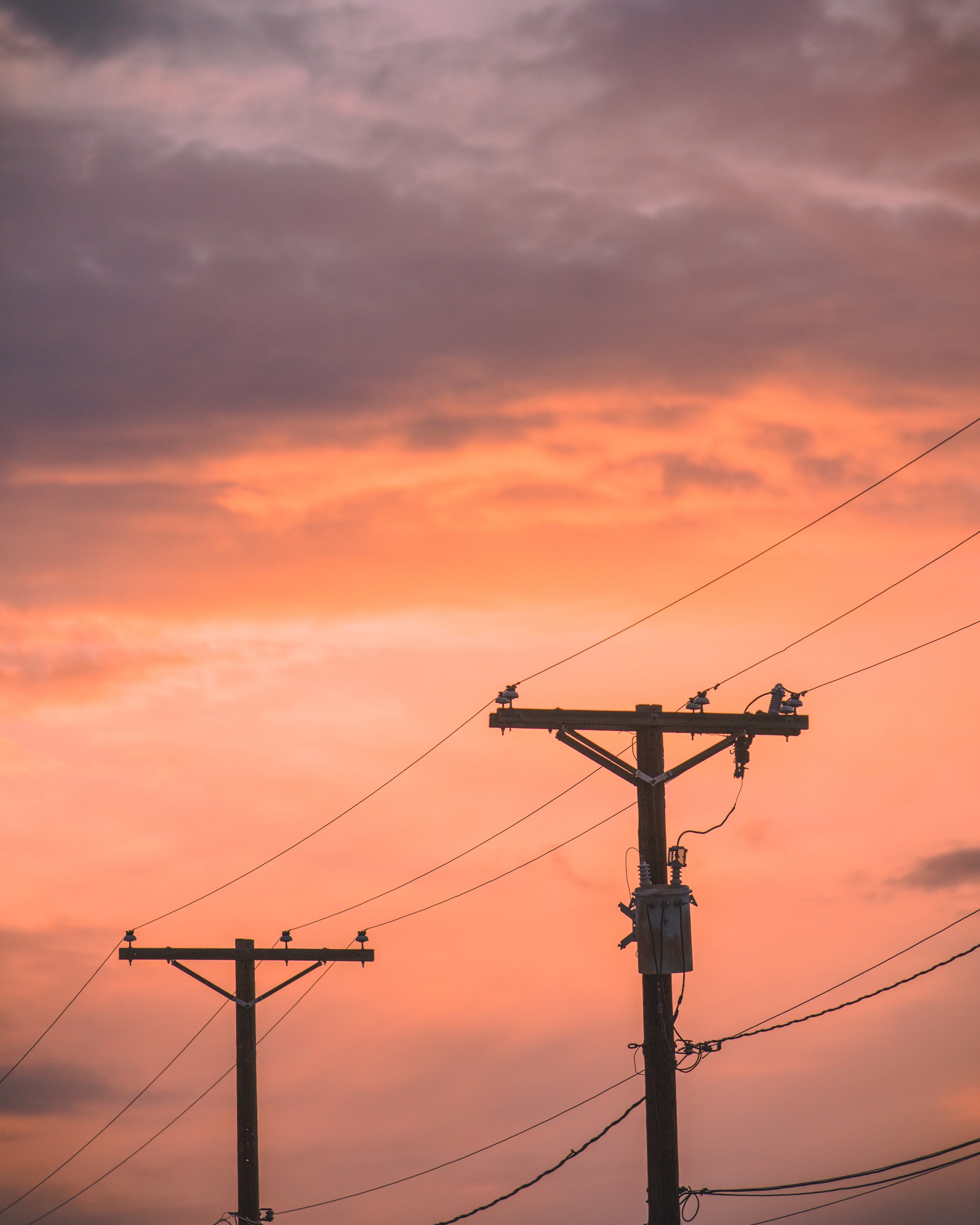 Power Line under the Orange Sky 